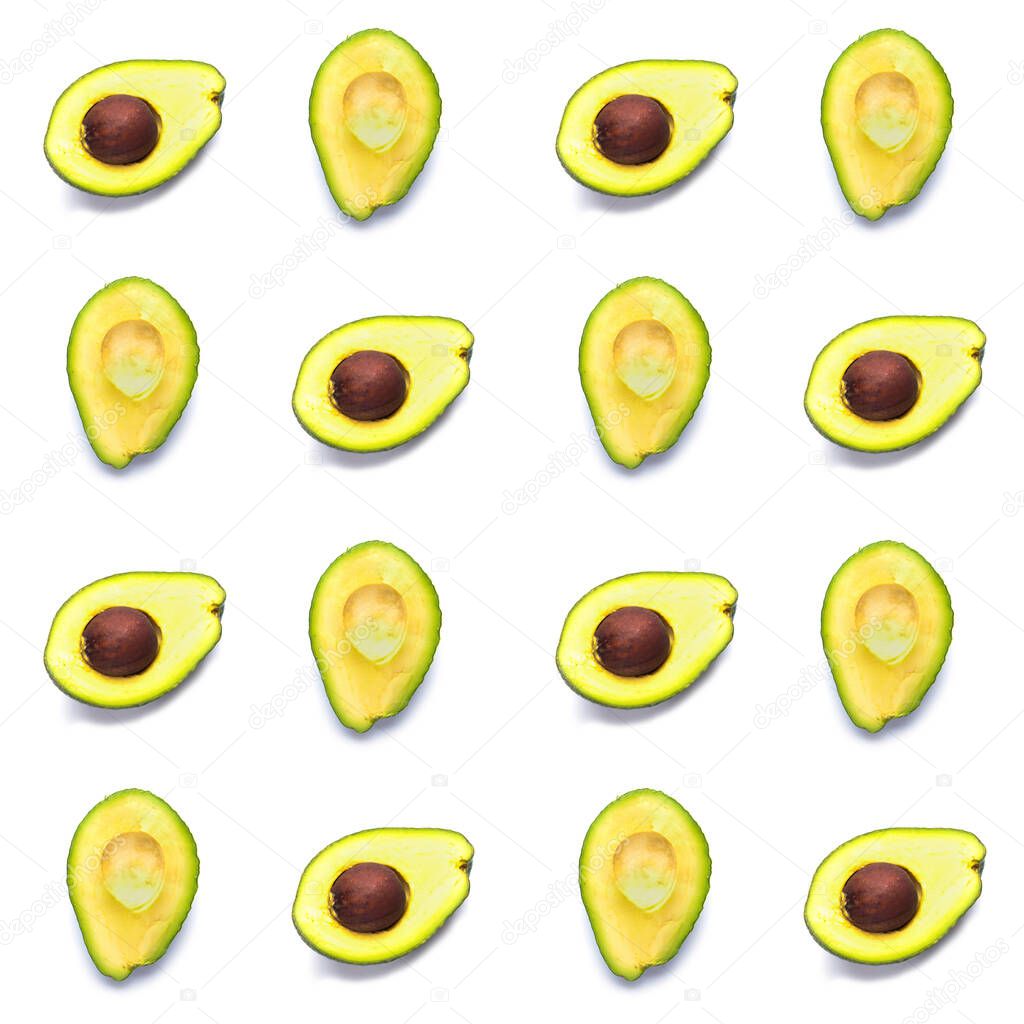 Avocado seamless pattern. Background made from isolated avocado pieces on white background. Flat lay of whole and half avocados, avacado pieces and seeds.