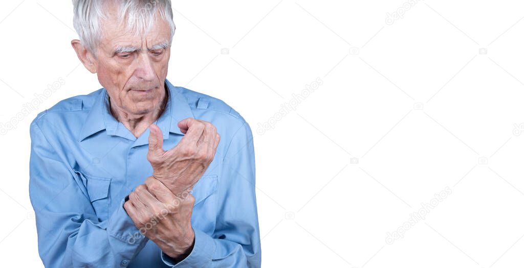 Male hand holding wrist. Eldery man suffering from pain in hand. Bone disease, arthritis or arthrosis.  Isolated on white background. Copy space for text