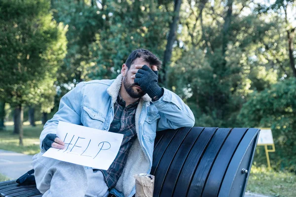 Young Sad Sick Poor Man Sitting Bench Street Holding Help — Stock Photo, Image