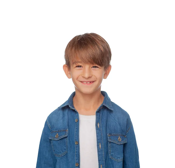 穿着蓝色牛仔裤夹克 背景为白色的男孩微笑 — 图库照片