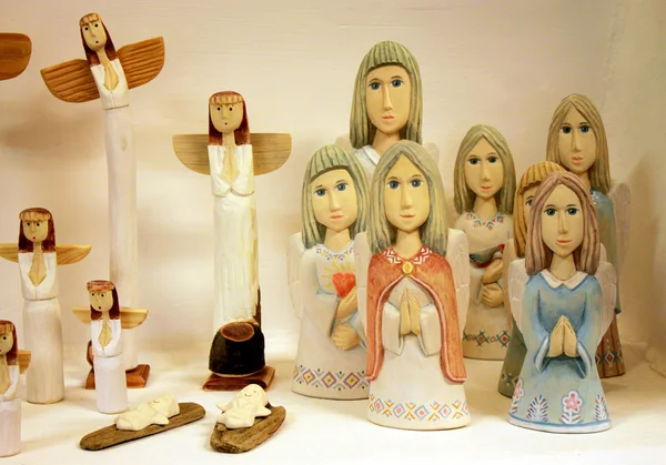 sculptures of souvenir wooden angels
