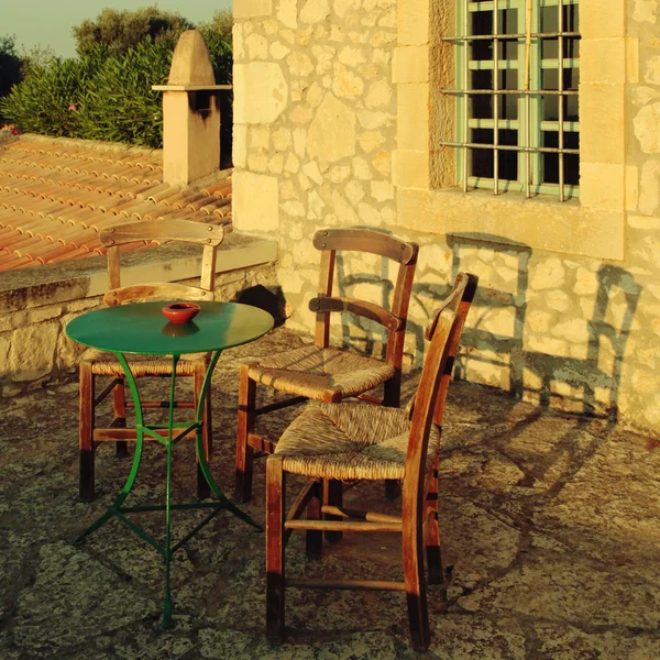 Greek country outdoor restaurant on roof terrace, Crete, Greece. — Stock Photo, Image