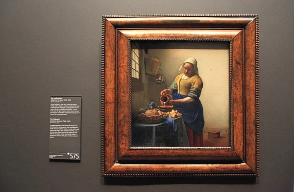 Oil Painting of The Milkmaid by Johannes Vermeer in Rijksmuseum, — Stock Photo, Image