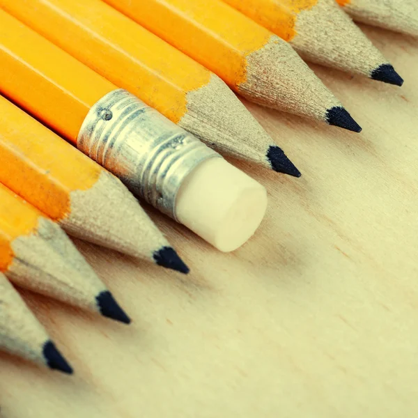 Diagonal group of pencils and eraser — Stock Photo, Image