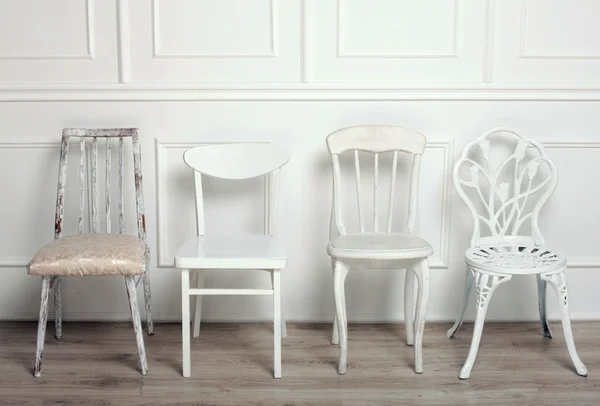 Set of white wooden vintage chairs — Stock Photo, Image