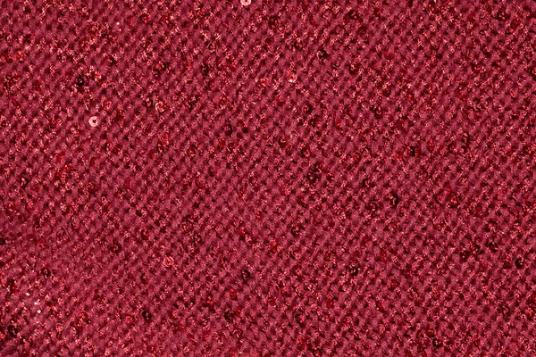 Red textile fabric with sequins as background — Stock Photo, Image