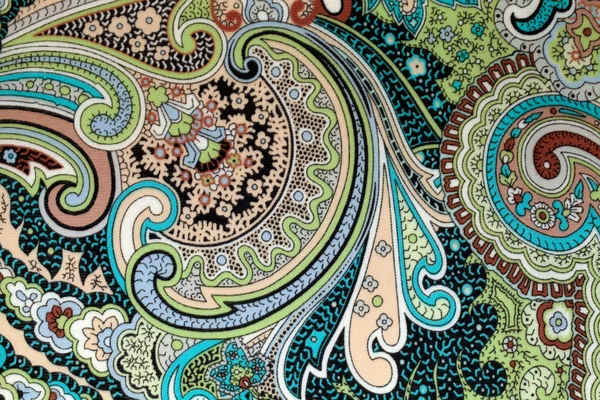 Colorful vintage fabric with blue and brown paisley print — Stock Photo, Image