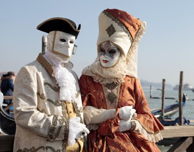 persons in Venetian mask and romantic costumes, Carnival of Veni
