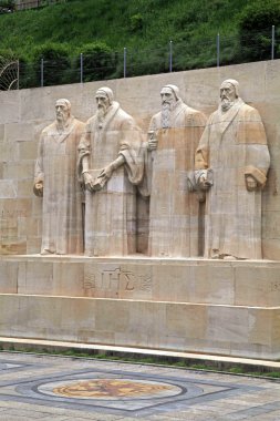 Sculptures on Reformation wall in Parc Des Bastions, Geneva, Switzerland clipart