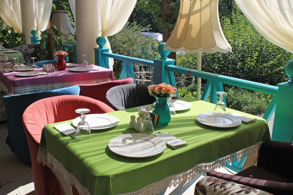 Beautiful bright colored terrace in country restaurant 스톡 사진