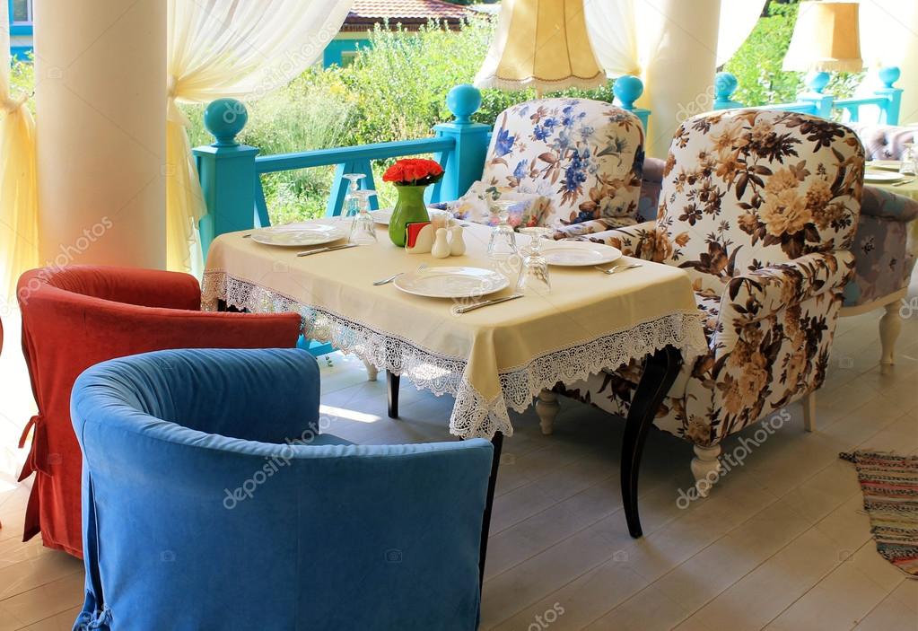 Beautiful Terrace With Bright Colored Furniture In Country