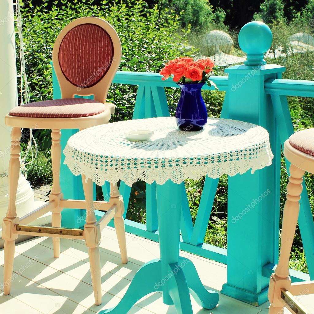 Beautiful Terrace With Bright Colored Furniture In Country