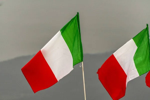 Italian flags flying in the sky