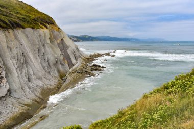 Zumaia ve Deba, İspanya arasında Bask Sahili UNESCO Global Geopark 'taki Flysch kaya oluşumları