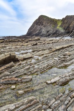 Zumaia ve Deba, İspanya arasında Bask Sahili UNESCO Global Geopark 'taki Flysch kaya oluşumları