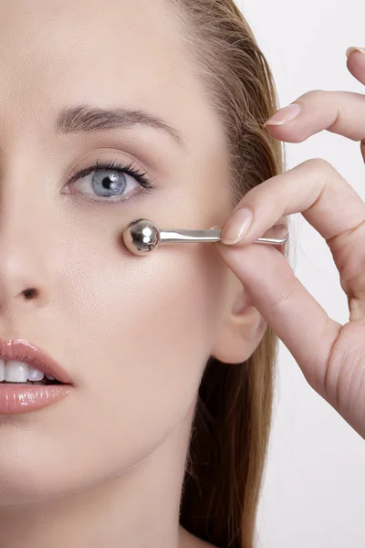 Closeup of beautiful model applying her skin treatment — Stock Photo, Image