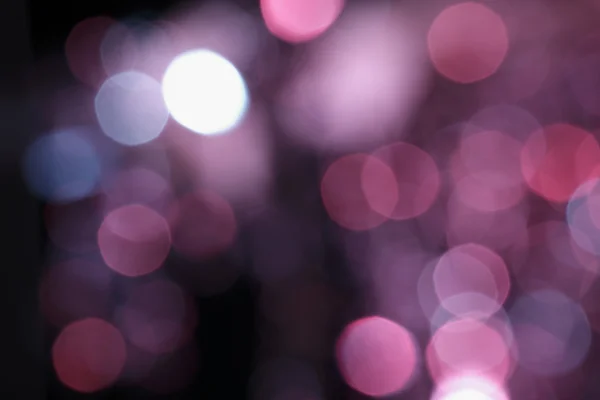 Linsenschlag verschwommenen Effekt funkelnden bunten Lichtern — Stockfoto