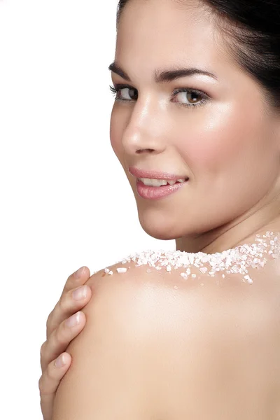 Beautiful young woman applying scrub treatment on the skin — Stock Photo, Image