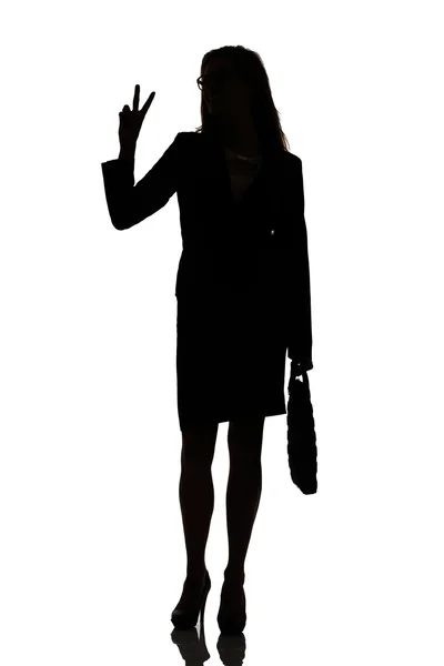 繁忙的商业女人背光工作室的剪影 — 图库照片