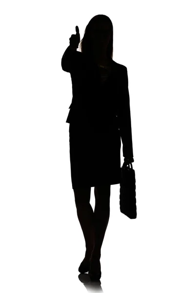 Silhouette d'une femme d'affaires occupée studio de rétroéclairage — Photo