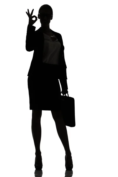 Silhouette einer geschäftigen Geschäftsfrau Hintergrundbeleuchtung Studio — Stockfoto