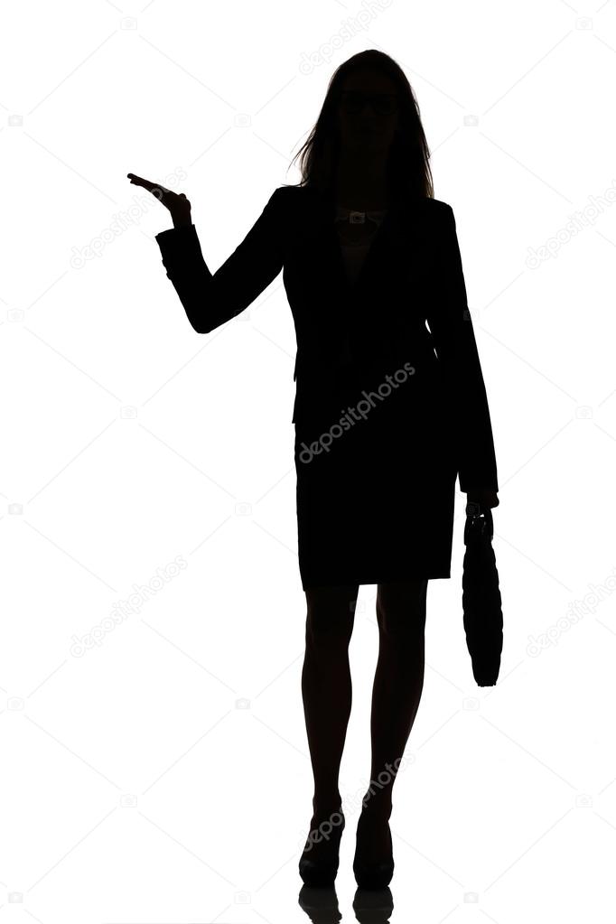 silhouette of a busy business woman backlight studio