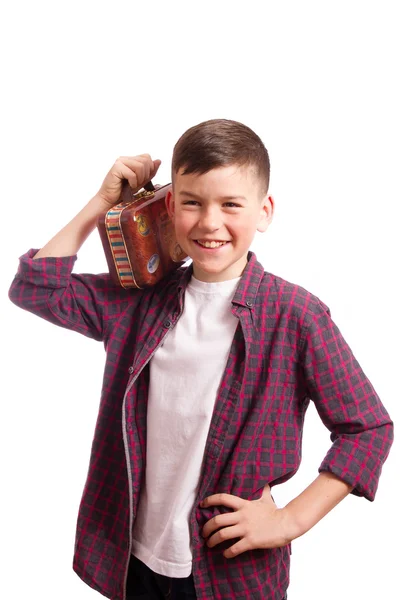 Pojken med en liten resväska — Stockfoto