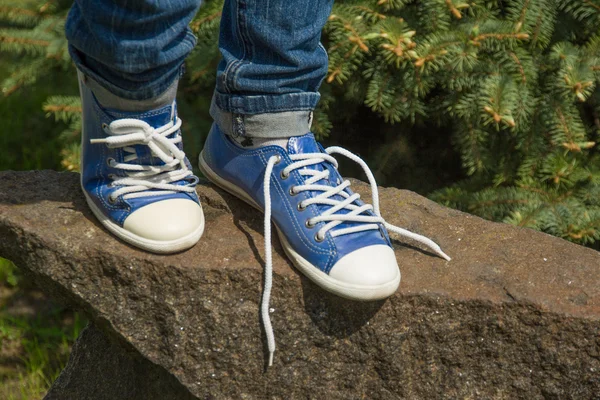 The lace on one Shoe was untied Royalty Free Stock Images