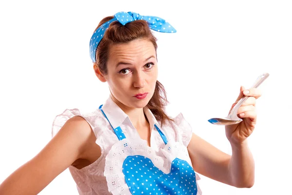 The girl gives to taste cooking Royalty Free Stock Photos