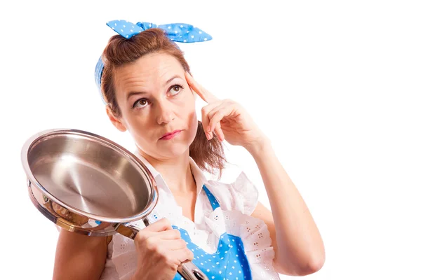 The girl with a frying pan — Stock Photo, Image