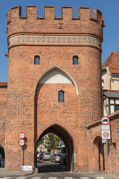 Brug toren poort en stad muren, torun, Polen — Stockfoto