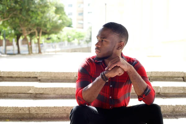 Pensive young african man — Stock Photo, Image