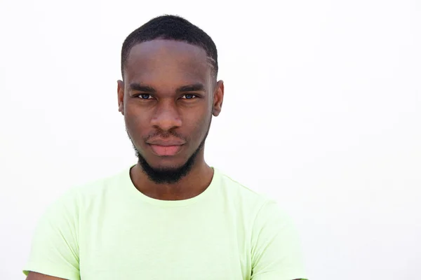 Jonge Afrikaanse man tegen witte achtergrond — Stockfoto