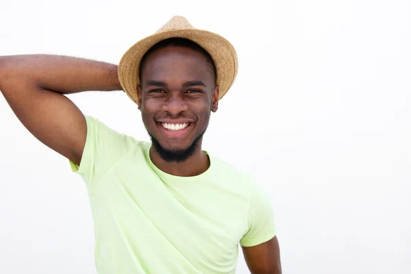 Legal jovem cara sorrindo com chapéu — Fotografia de Stock