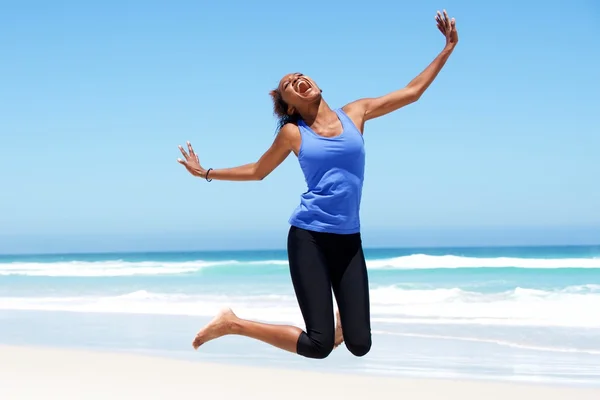 Young african woman jumping — Stock Photo, Image