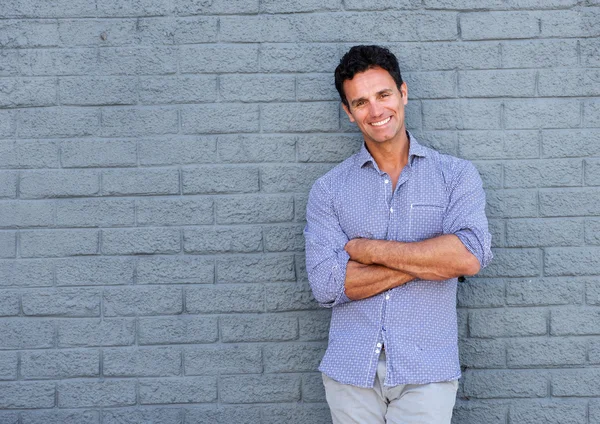 Handsome older man smiling — Stock Photo, Image