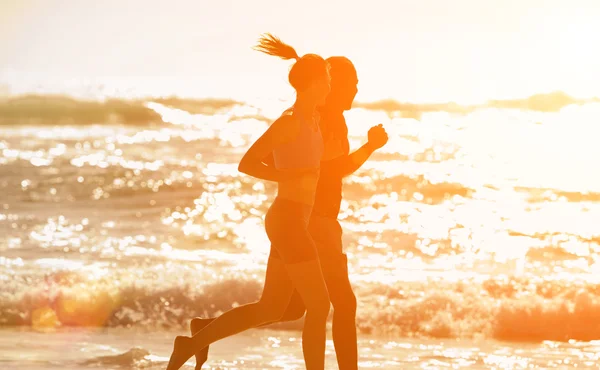 Fitness couple running — Stock Photo, Image