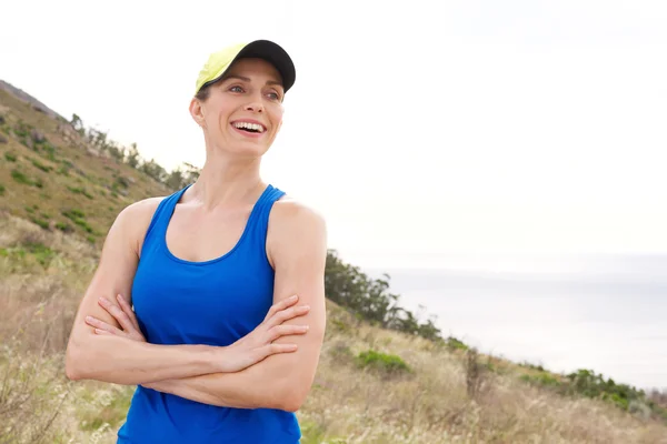 Lachende athletische Frau — Stockfoto