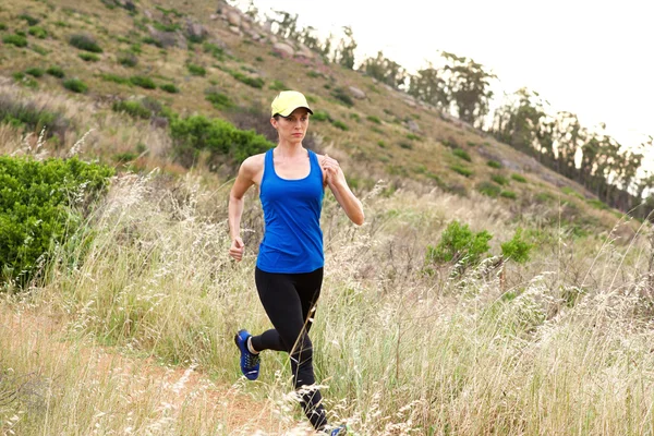 Active older woman running — Stock Photo, Image