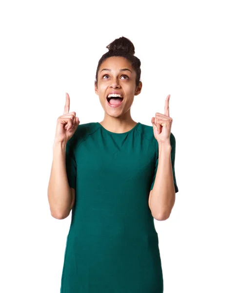 Surprised young african woman pointing up — Stock Photo, Image