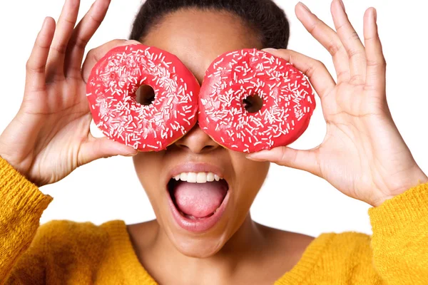 Woman holding colorful donuts — Stock Photo, Image