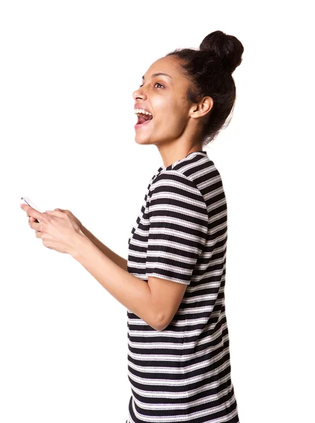 Jovencita riendo con teléfono móvil — Foto de Stock