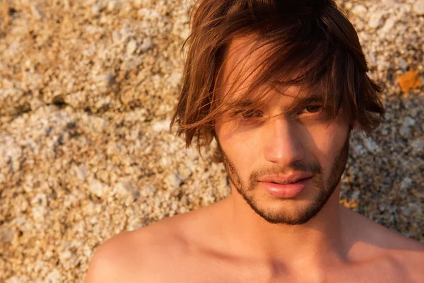 Handsome young shirtless man staring — Stock Photo, Image