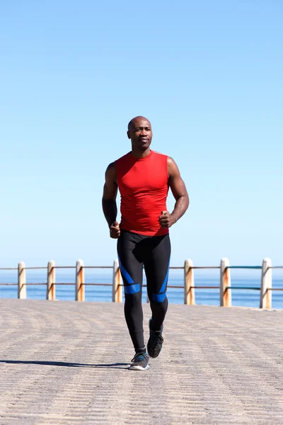 Muscular african man running — Stock Photo, Image