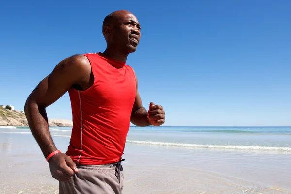 Healthy young african guy running — Stock Photo, Image