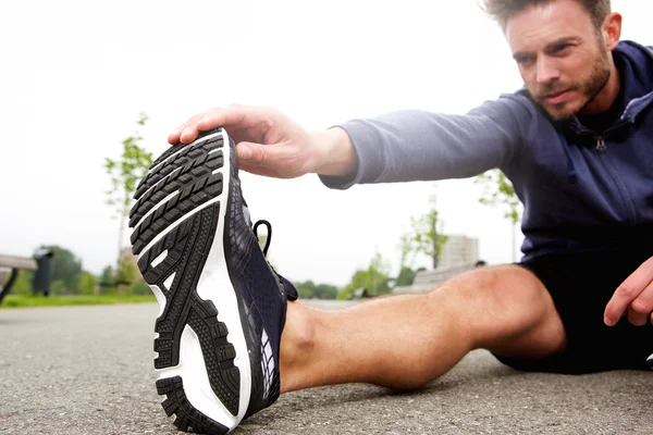 Streç yapmak dışında oturma runner sokakta