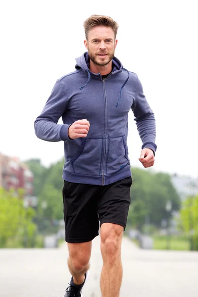 Handsome middle age jogger outside — Stock Photo, Image
