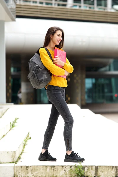 Happy student walking to class — Stock Photo, Image