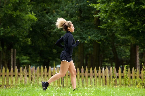 Young female runner outside — Stock Photo, Image