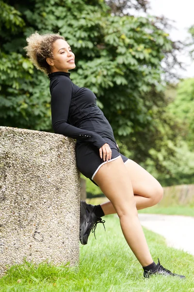 Beautiful athletic woman resting — Stock Photo, Image